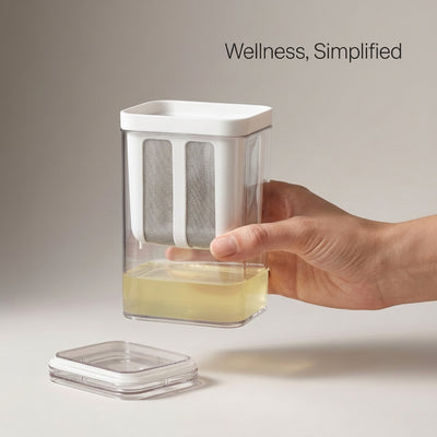 Fine-mesh Greek yogurt maker separating whey from plain yogurt for a creamy, high-protein result