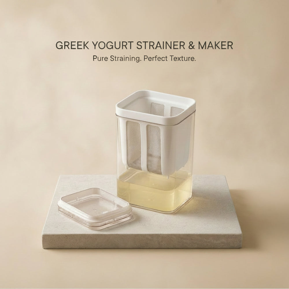 Plain yogurt straining into thick Greek yogurt in the reusable fine-mesh Greek yogurt strainer